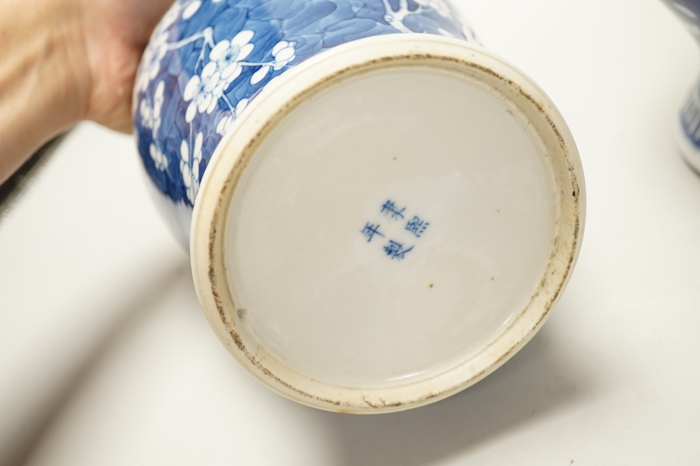 Two late 19th century Chinese blue and white prunus pattern vases, tallest 28cm high (a.f.)